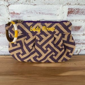 Purple and gold wristlet clutch